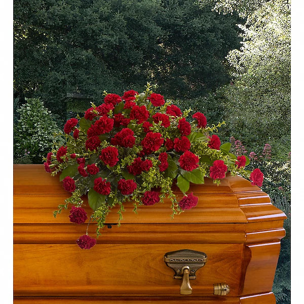 Wooden casket with a red floral