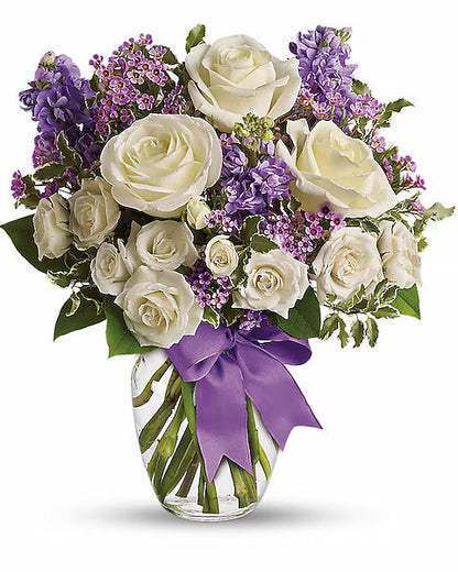 white roses and purple flowers