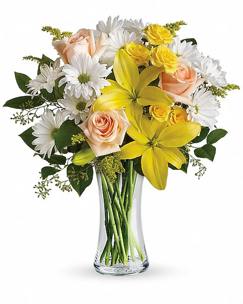yellow lilies, white daisies, and pink roses