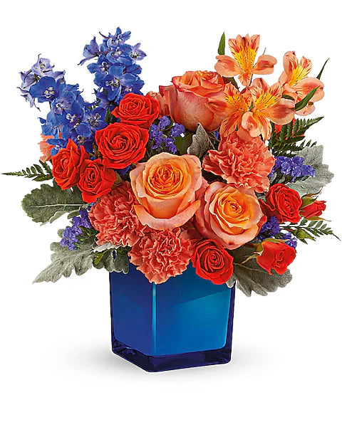 flowers in a blue vase